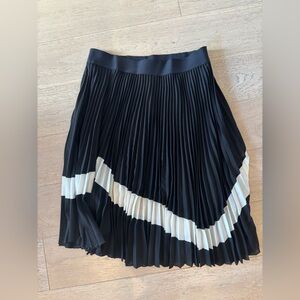 Black and white pleated skirt.